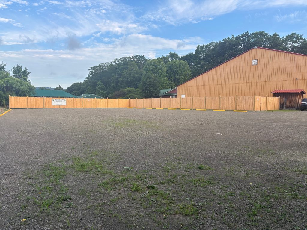 Parking area beside facility